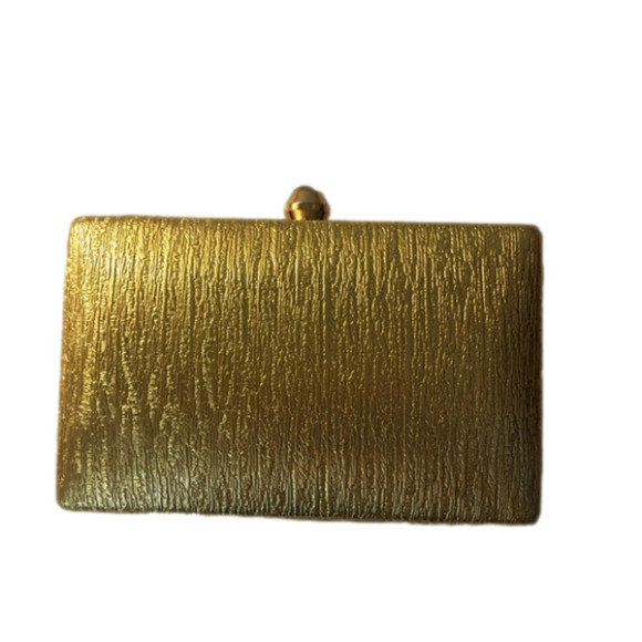 Charming Charlie Handbags - CHARMING Charlie Hard Shell Gold Clutch
